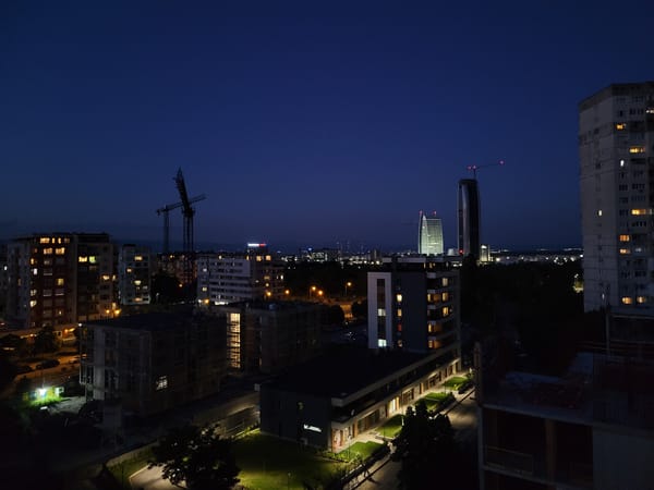 Sofia skyline at dusk, construction and city lights