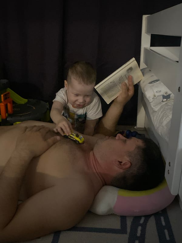 Child plays with toys during sunset in Sochi