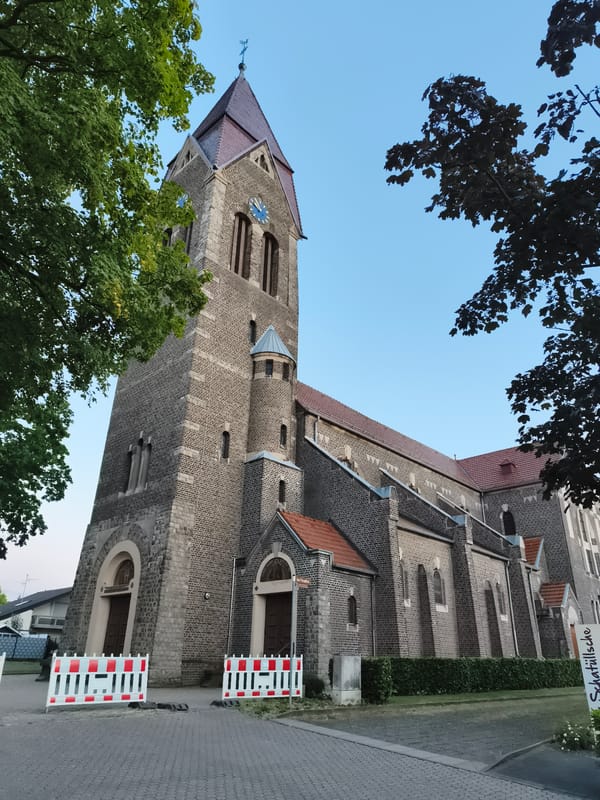 Brick streets, a church, and everyday scenes in Eschweiler