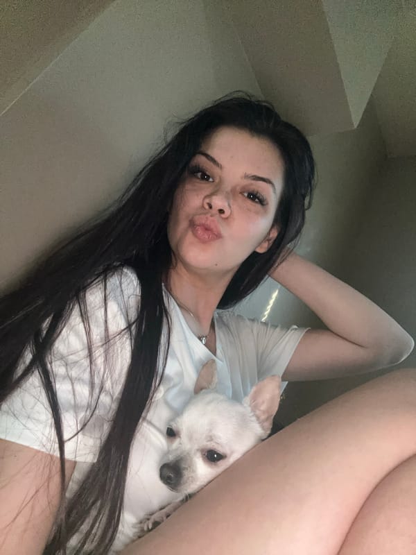 Woman and small dog photographed in casual selfies in Sliven