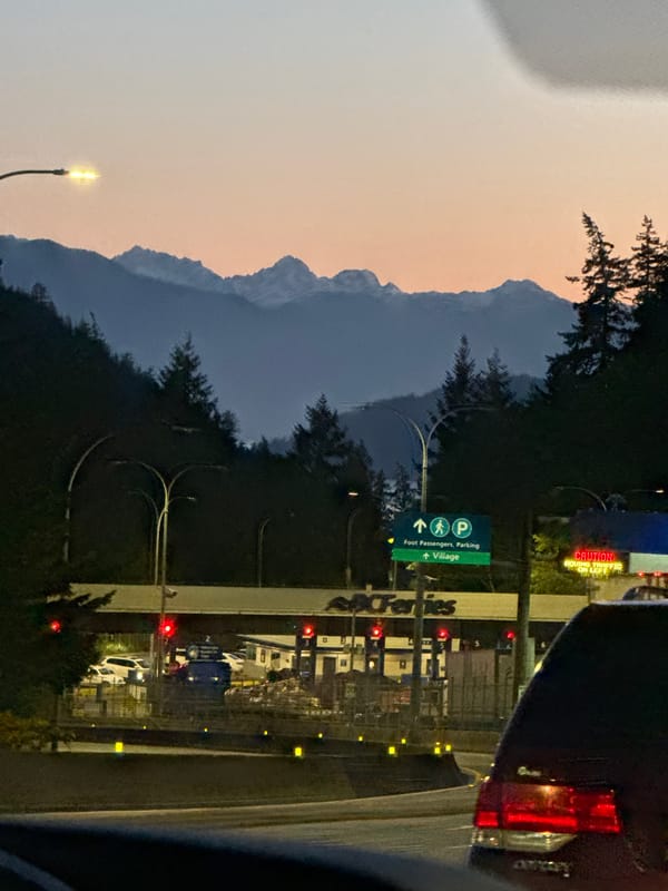 Driver navigates winding West Vancouver highway in BMW X7