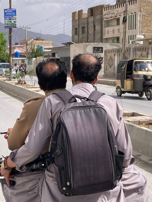 Two men spotted on Quetta street during overcast day