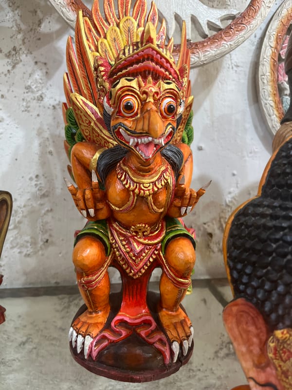 Tourist browses traditional craft shops in Ubud Indonesia