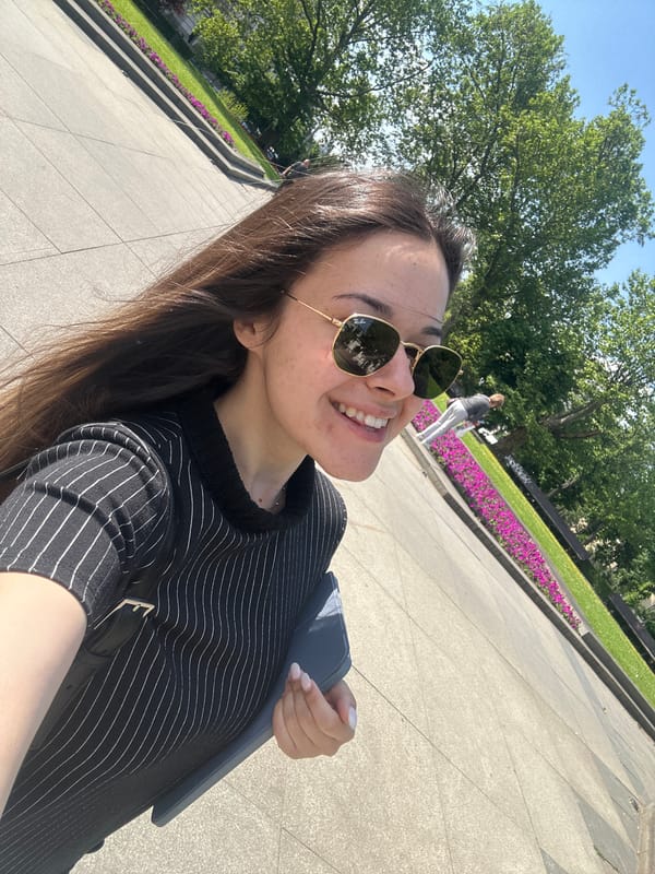Woman takes morning selfies in Sofia park