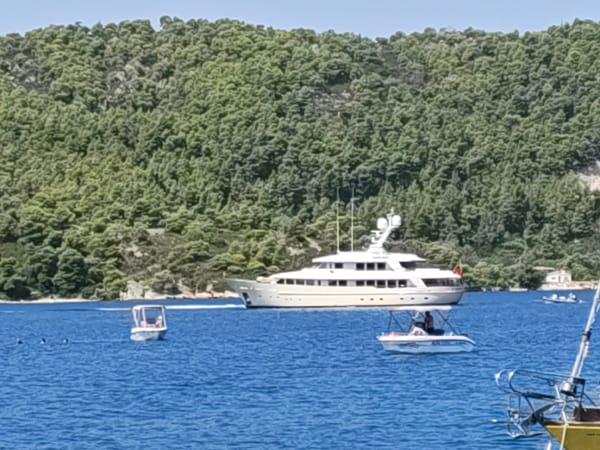 Luxury yacht cruising calm Aegean waters off Sithonia
