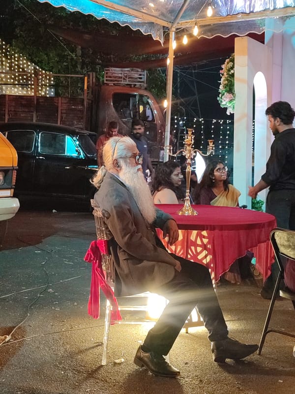 Evening outdoor gathering held in Kalamassery under decorated tent