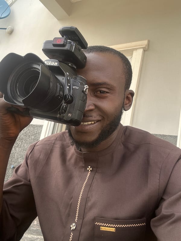 Portrait session underway in Jos, Nigeria, cameras and phones out