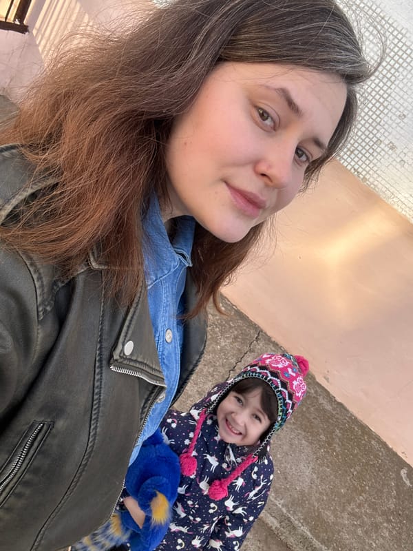 Woman and child take winter selfies in Chaikovsky, Russia