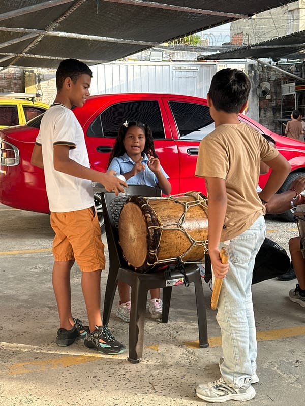Community music event with children performing in Barranquilla