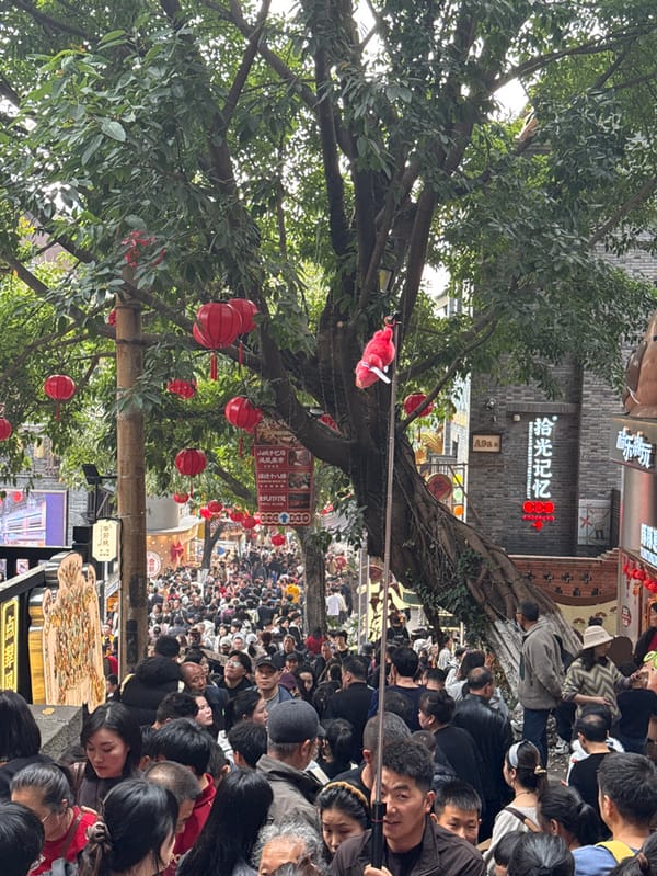 Festival crowds pack decorated streets in Chongqing's Yuzhong District