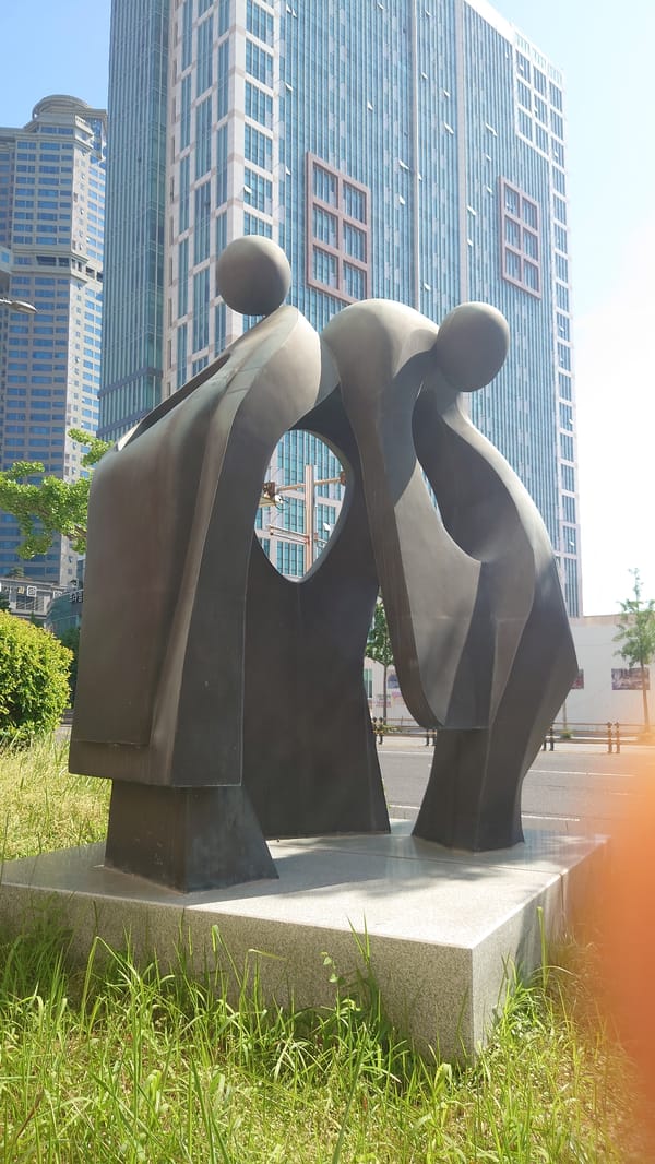 Urban scenes documented in Ulsan including sculpture, Ferris wheel