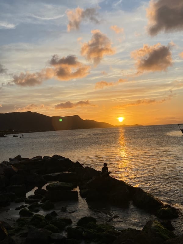 Sunset beach gathering draws paddleboarders, swimmers to Juan Griego