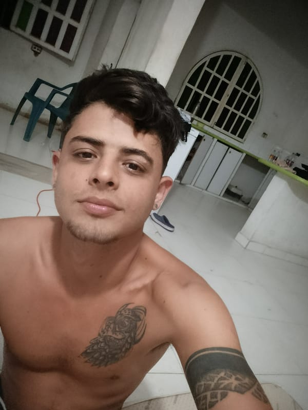 Man Takes Selfie, Shows Owl Tattoo at Dawn