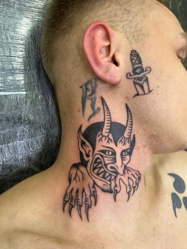 Tattooed man photographed in close-up shot in Moscow