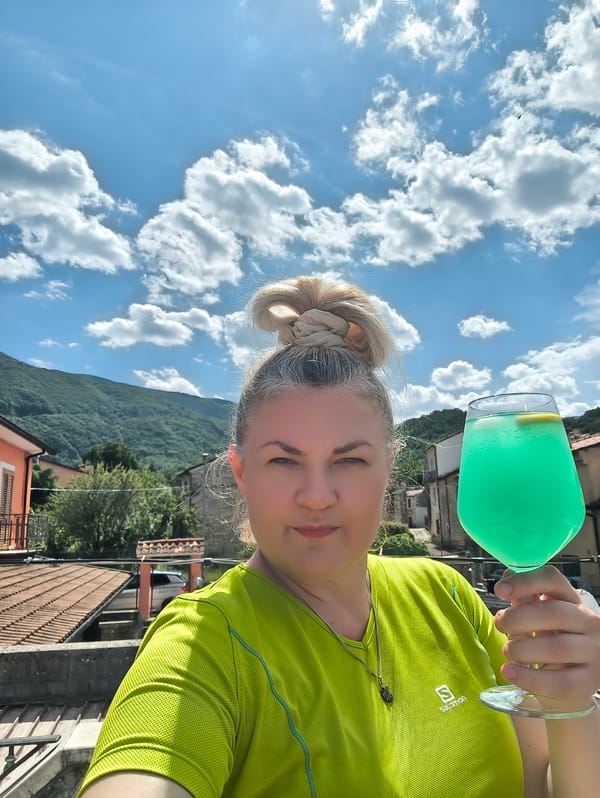 Summer spread with green drinks, fresh fruit, and pastries in Campochiaro