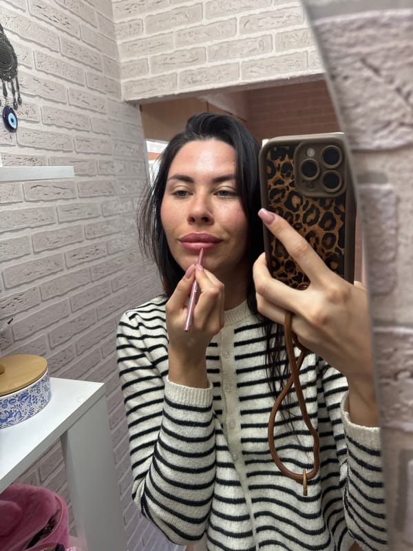 Mirror selfies and a lipstick touch-up in Chaikovsky