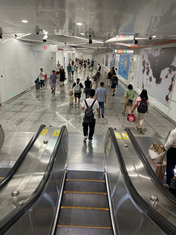 Inside a Guangzhou subway station during the morning rush