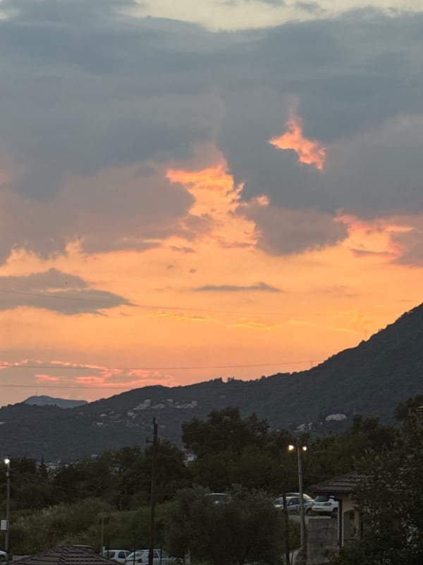 Sunset over Sustaš, Montenegro — mountains, coast, golden clouds