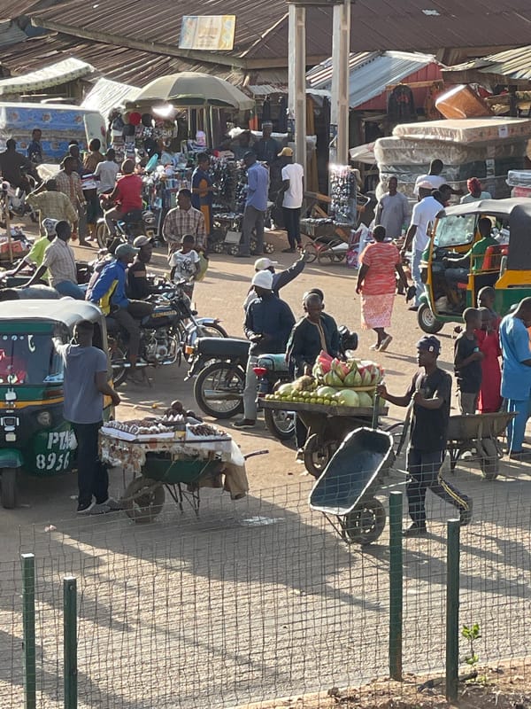 Ordinary afternoon street life documented across Bukuru, Nigeria markets