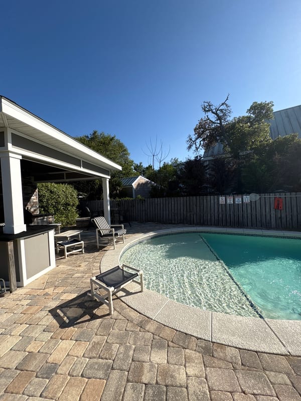 Backyard pool scene captured in Panama City Beach