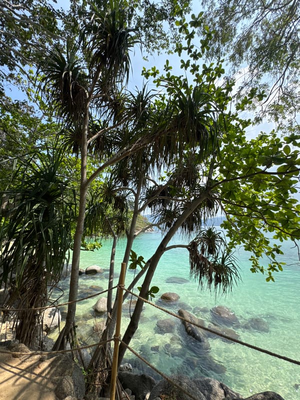 Early morning beach activity captured in Patong, Thailand