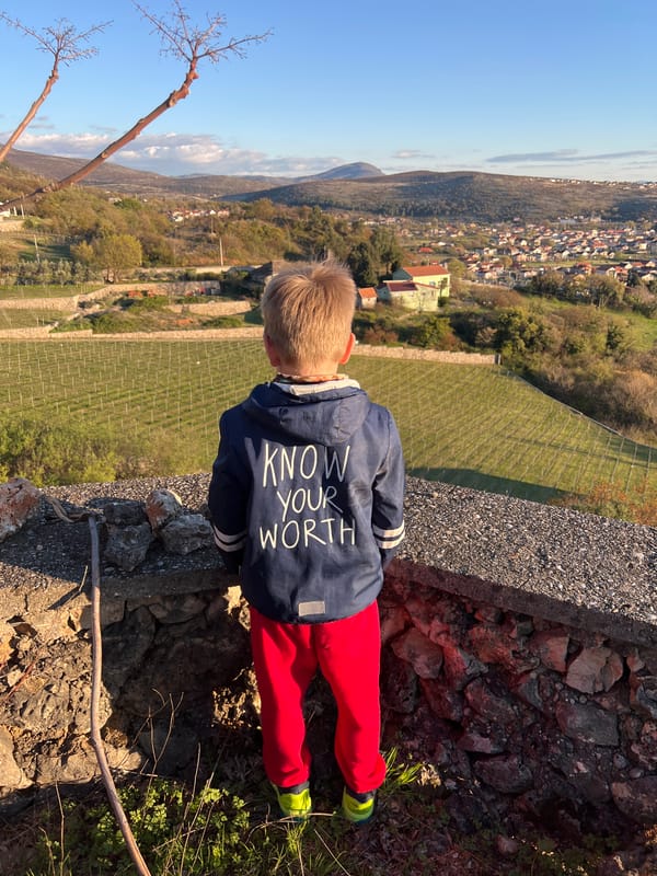 Family explores Podgorica hillsides, captures sunset views during afternoon outing