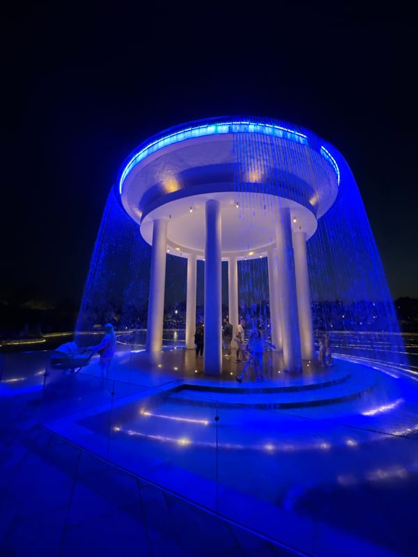 Krasnodar's color-lit fountain draws a crowd on a summer night