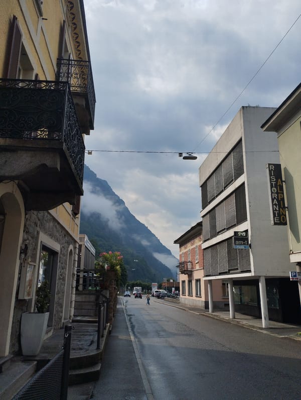 Morning documentation of wet streets and daily life in Biasca