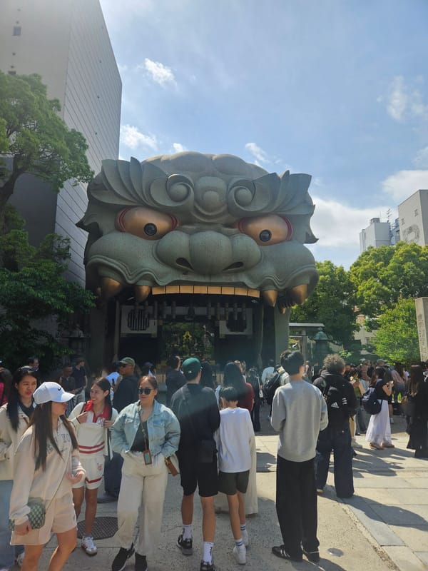 Early morning crowd gathers at Namba Yasaka Shrine, Osaka