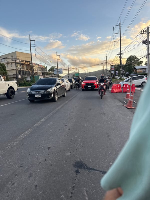 Traffic scenes documented in Wichit, Thailand including emergency ambulance