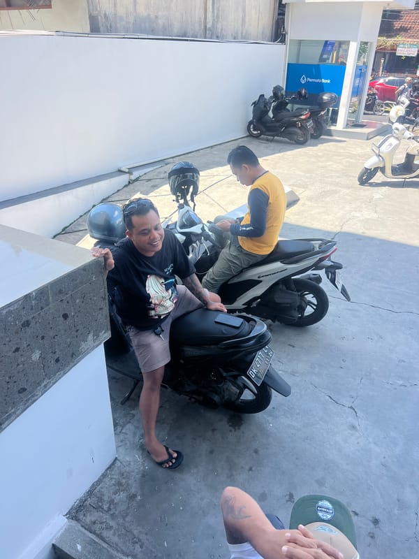 Morning street life documented near Permata Bank in Ubud