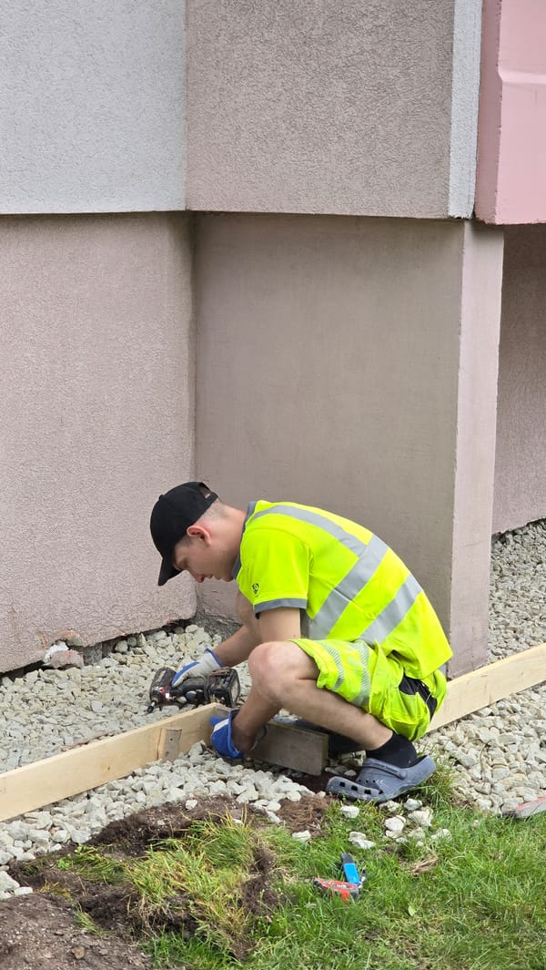 Gravel path construction underway at a Tallinn building