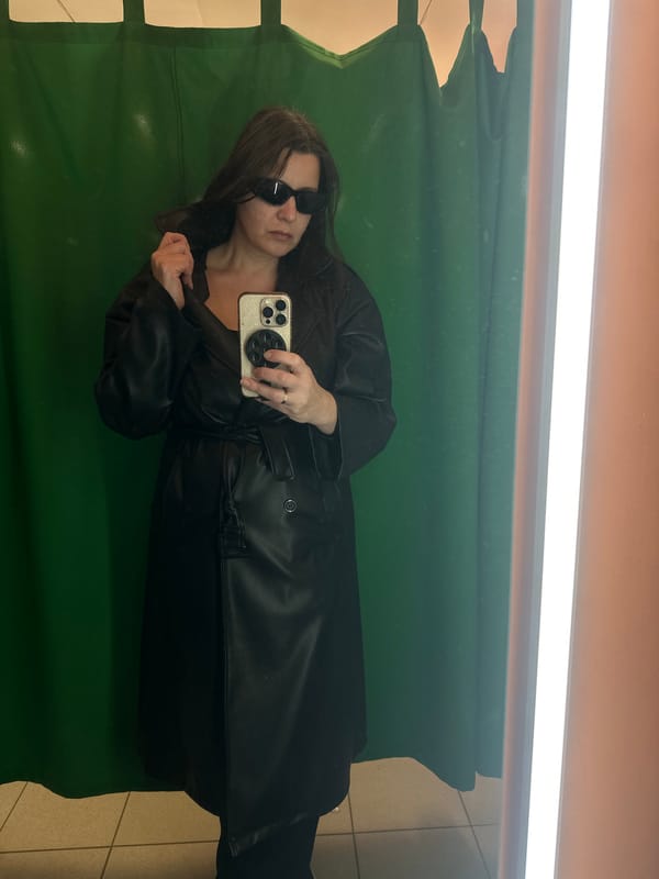 Woman takes mirror selfie in Riga changing room