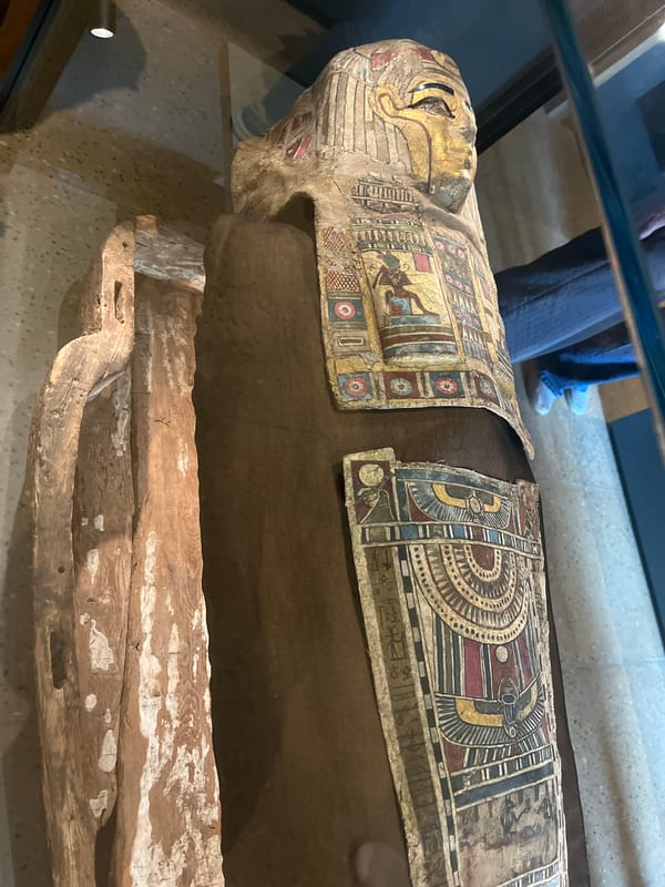 Museum visitor documents ancient artifacts during hour-long tour