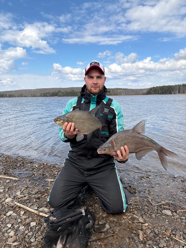 Angler displays catch of two fish in Chaikovsky, Russia