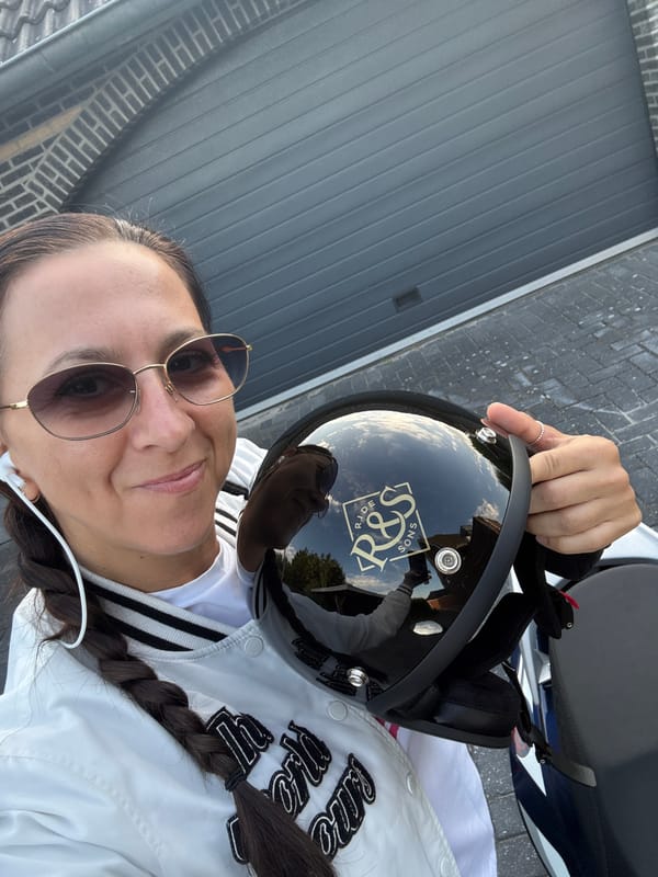 Motorcycle helmet in hand, ready to ride in Leek