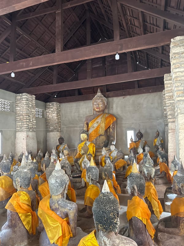 Inside a richly detailed Thai temple complex in Baan Harn