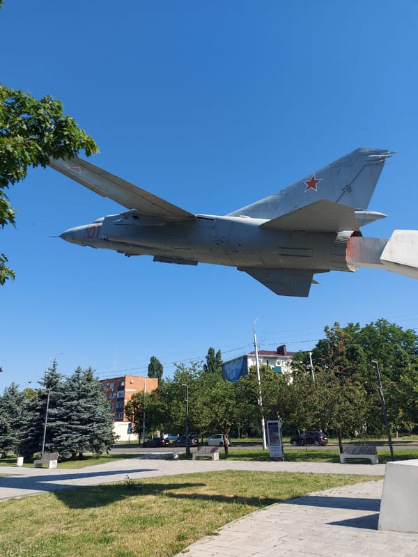 Sunny morning in Maykop's central park and streets