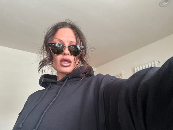 Woman in sunglasses, hoodie spotted indoors in Tunbridge Wells