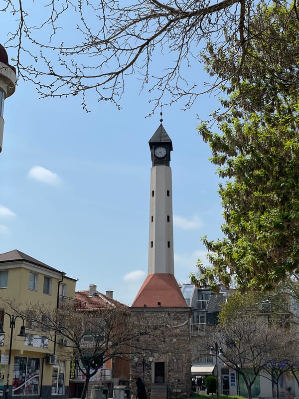 Visitor documents Pazardzhik clock tower from multiple angles