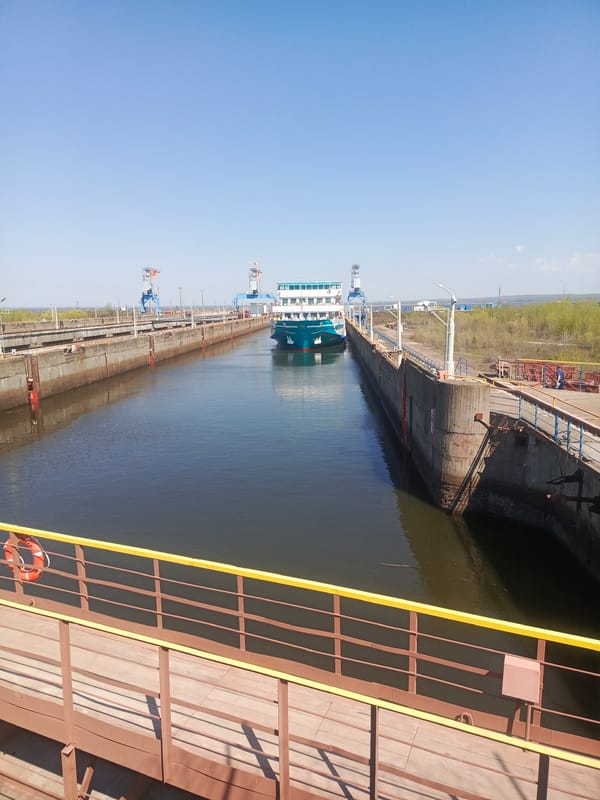 Ship transits locks on Kama River in Chaikovsky, Russia
