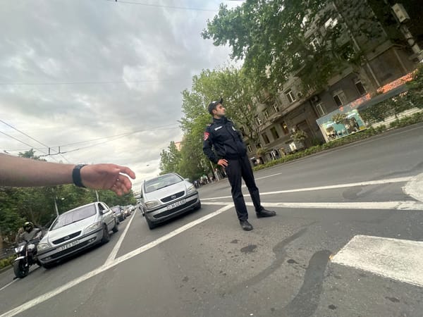Ordinary street life documented across Yerevan during afternoon hours