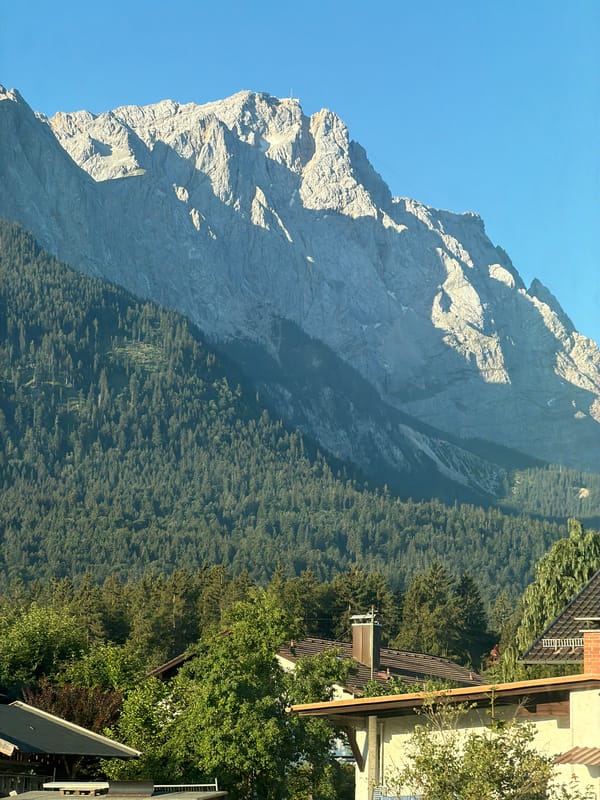 Zugspitze rocky peaks under golden and blue-sky light