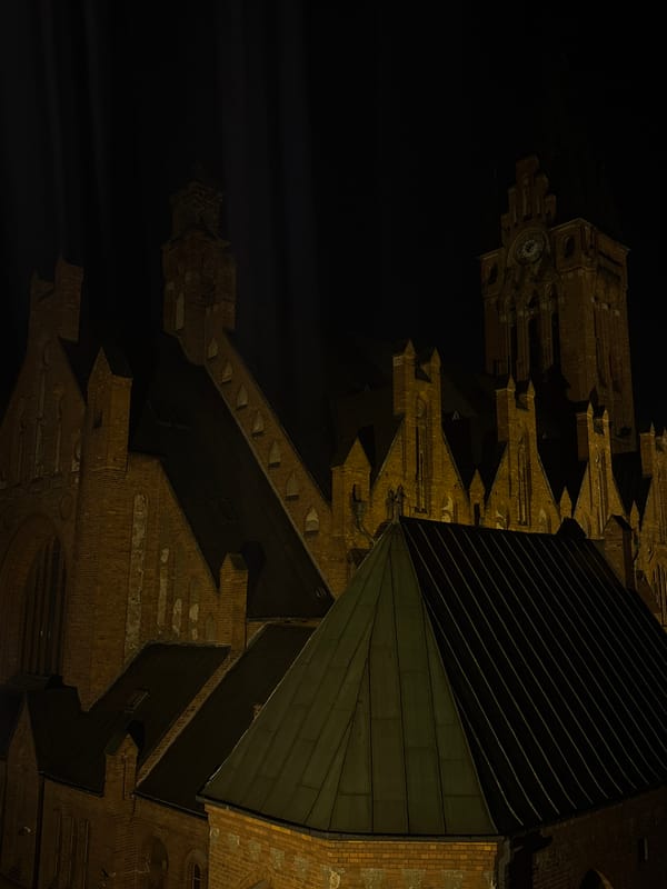 Nighttime scenes captured at Bydgoszcz cathedral and hotel room