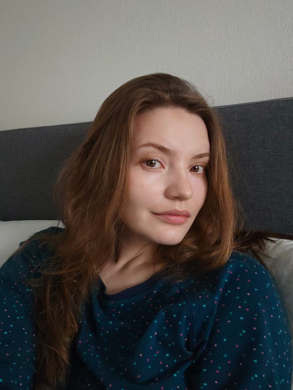 Woman photographed in close-up portraits, one from bed