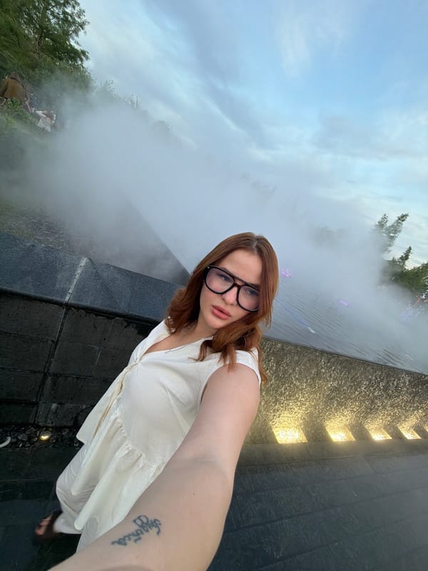 Woman takes selfie amid misty landscape in Krasnodar