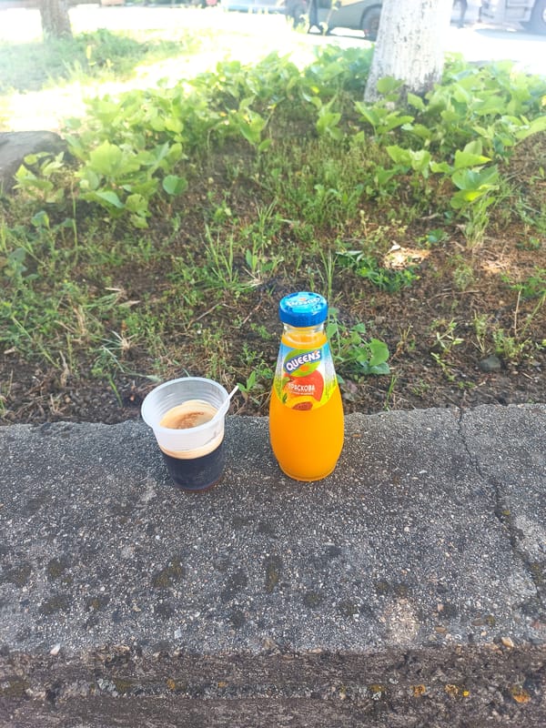 Coffee and juice bottle spotted on concrete in Venets
