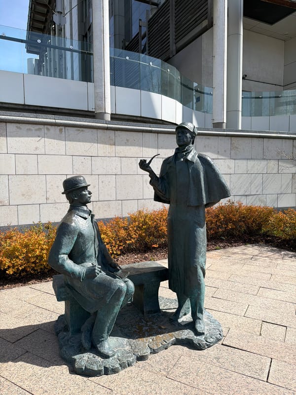 Moscow resident documents breakfast and Holmes statue during morning