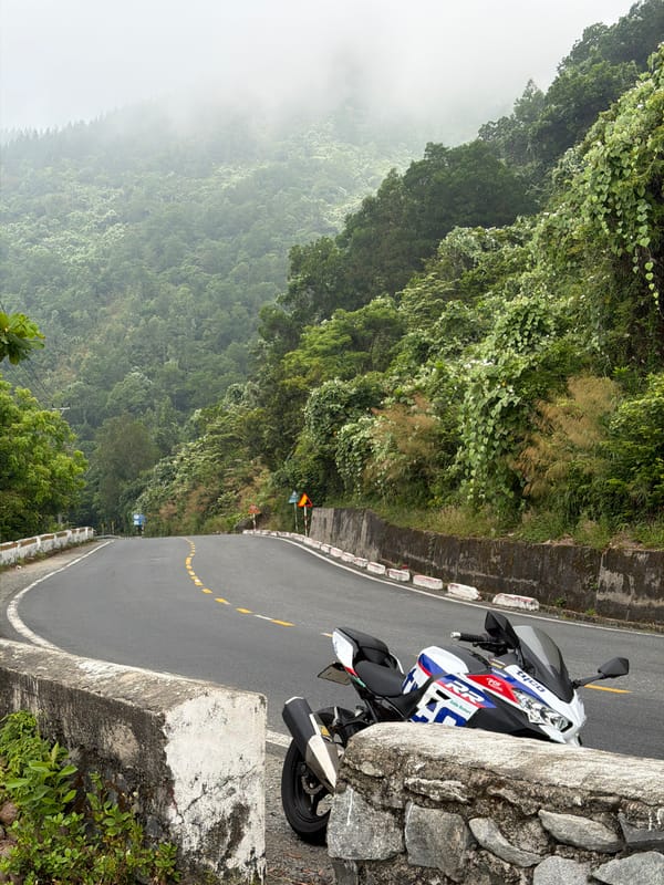 Motorcyclist spotted on winding road in Đà Nẵng, Vietnam