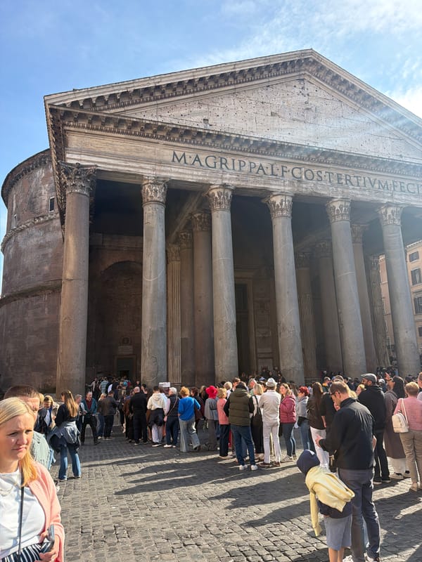 Tourists queue at Rome's Pantheon entrance